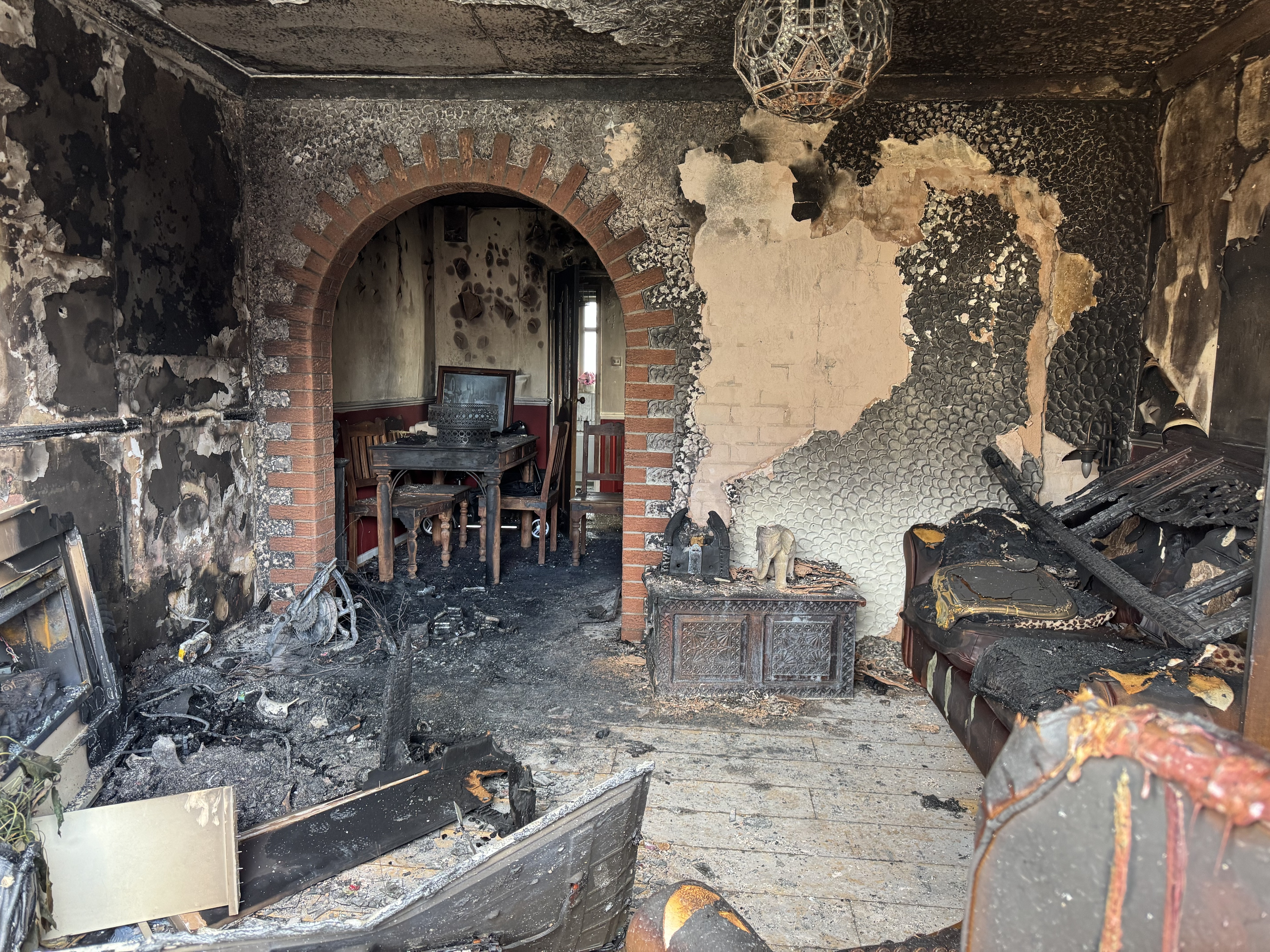 Landscape photo inside of a house, burnt, following fire