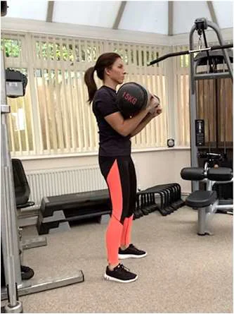 Demonstration of the up position for the clean and press exercise