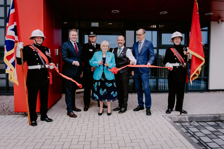 Cutting of the ribbon outside Worksop Fire Station at the official opening,