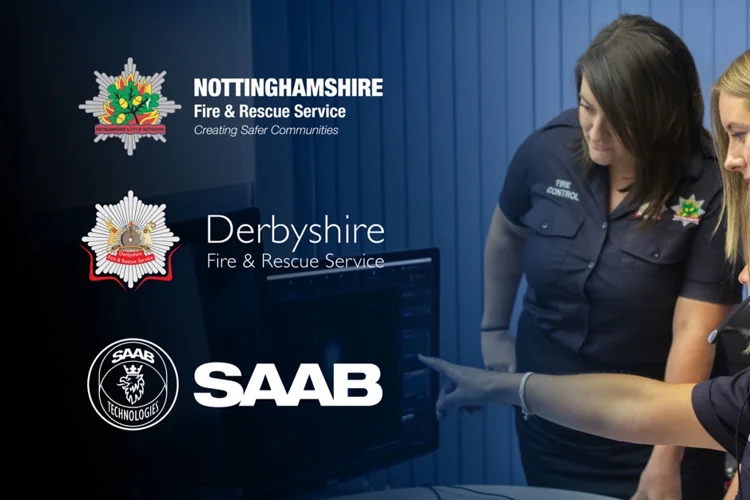 Fire control operators point at a screen with the logos of NFRS, DFRS and Saab on the left.