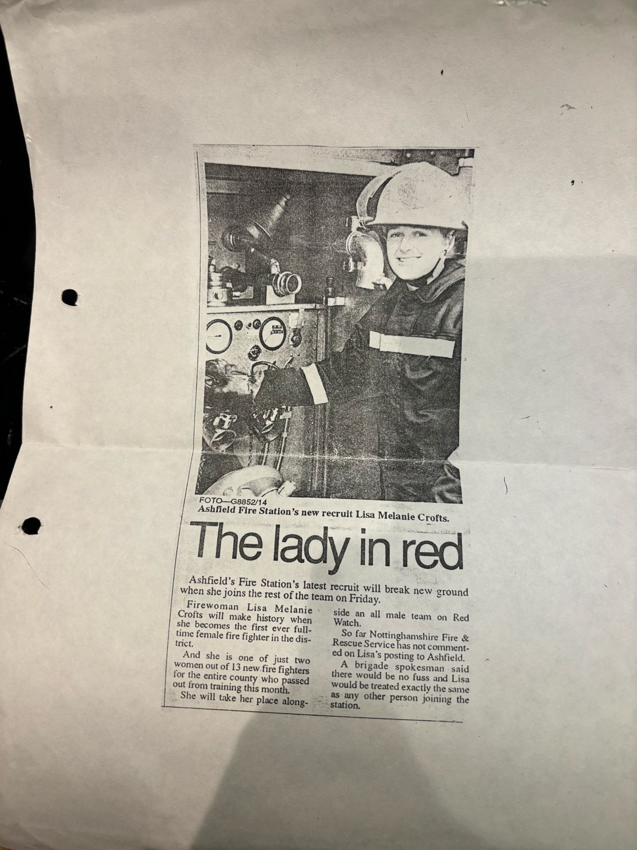 Newspaper clipping of female firefighter 