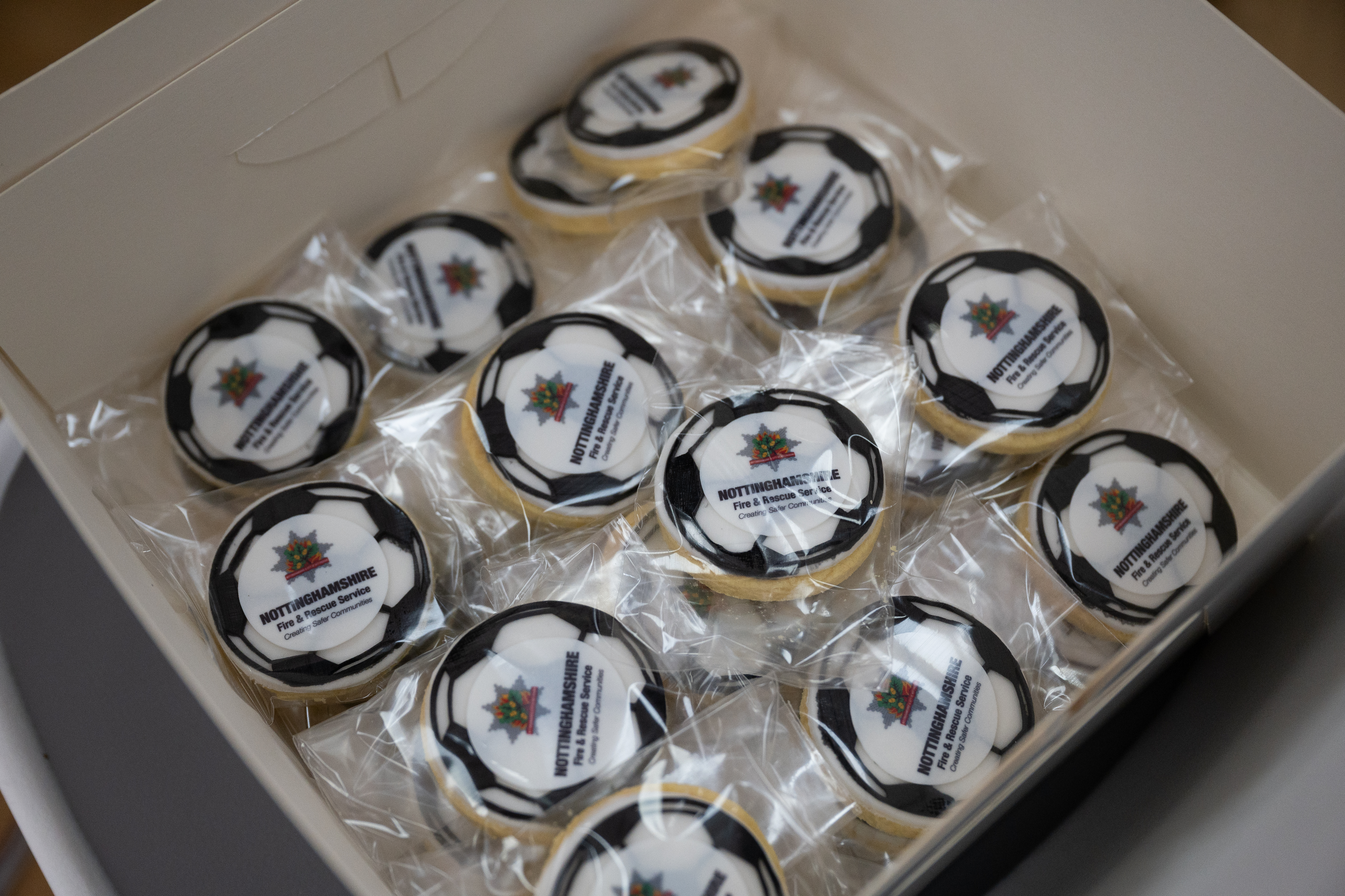 Football themed biscuits with NFRS logo on them 
