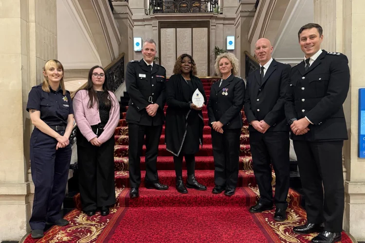 seven members of Nottinghamshire Fire and Rescue Service recieving the Emergency Service of the Year Award