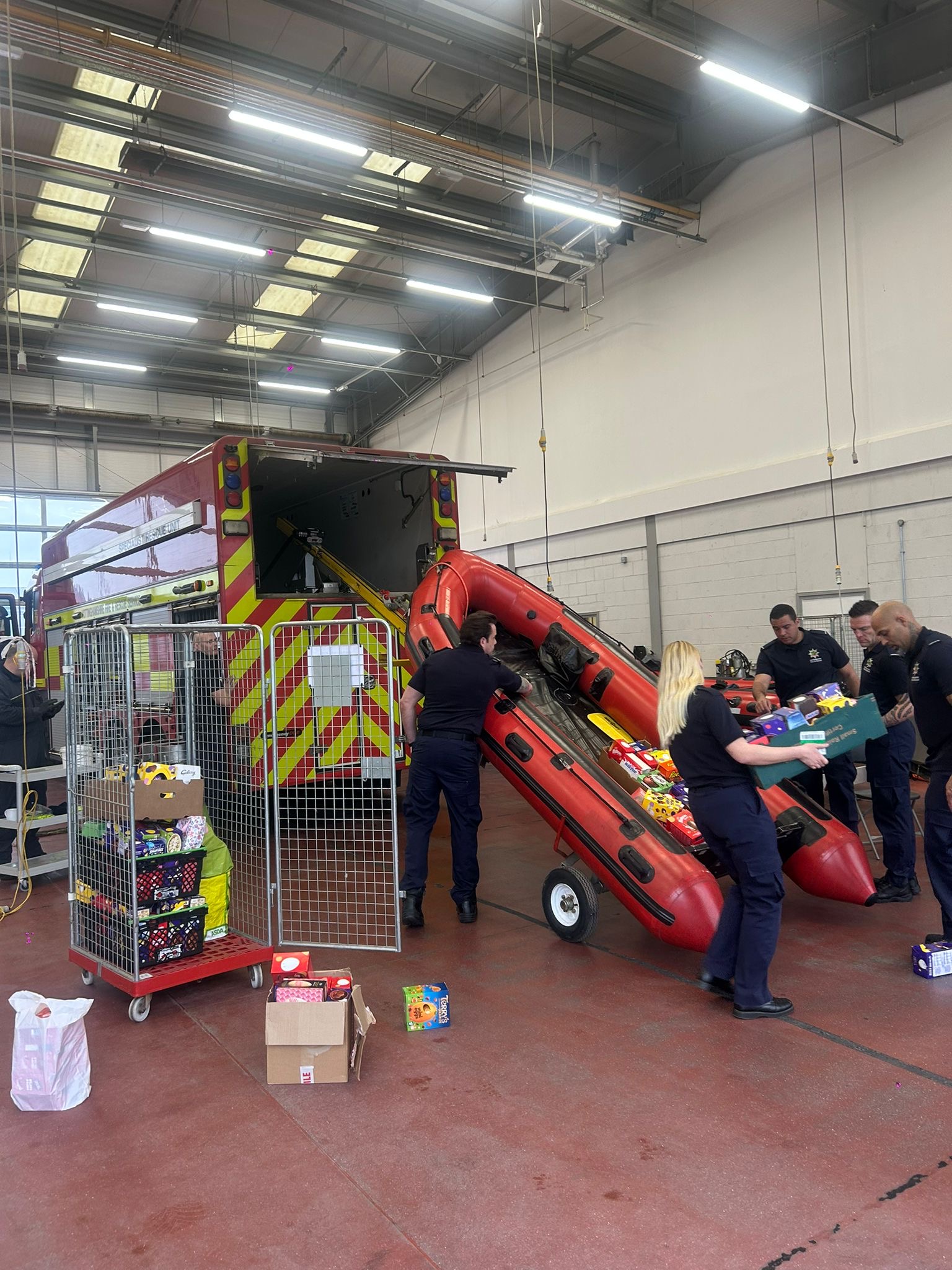 Crew loading boat with Easter Egg donations