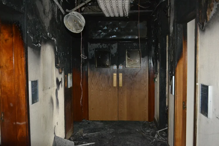 Fire door inside Nottingham County Council building showing it helped to prevent the spread of fire