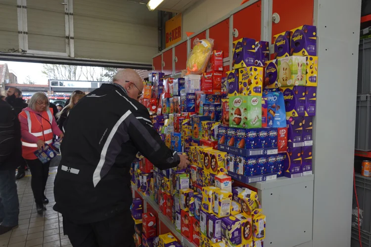 Biker placing Easter Eggs on the pile