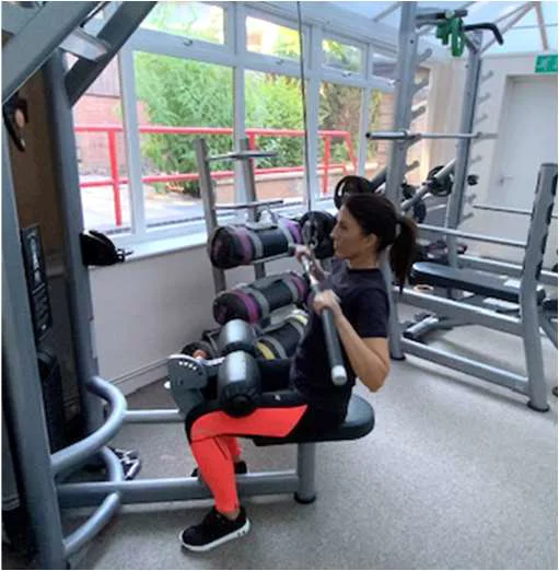 Example of a lat pull down with bar brought to shoulder height