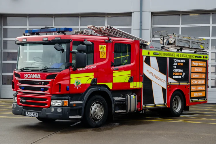 Highfields Fire Engine with new White Ribbon wrapping on seen from the front passangers side