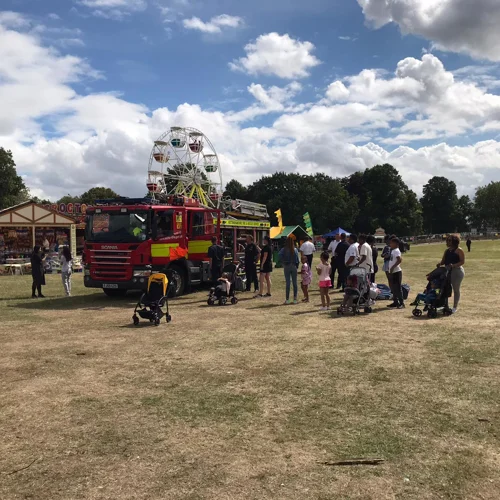 Families being shown around a fire engine at Nottingham Carnival
