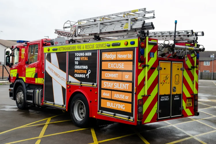 Highfields Fire Engine with new White Ribbon wrapping on seen from the rear passanger side