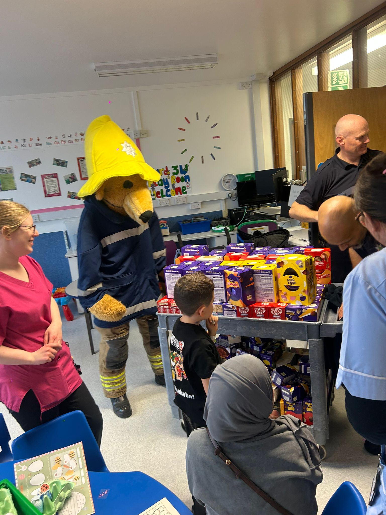 Children at QMC receiving Easter Eggs 