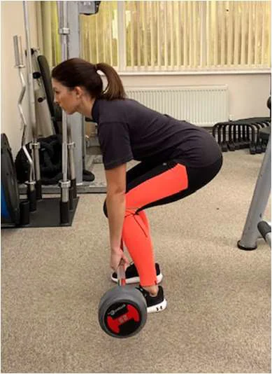 Deadlift using a bar bell