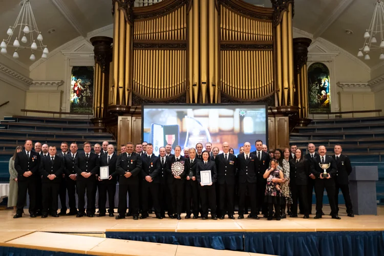 The group of awards winners on stage at the Albert Hall with the organ in the background.