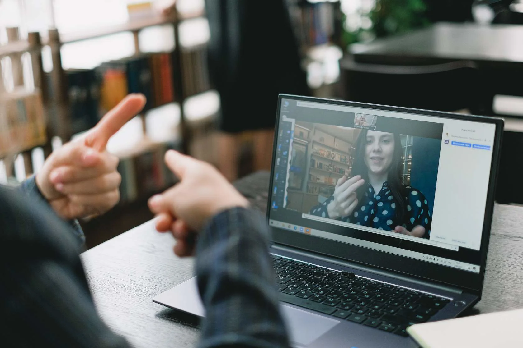 A video call such as teams or zoom between two deaf people using sign language