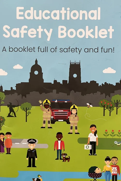 Colourful front cover of educational safety booklet showing a cartoon version of Nottinghamshire including a cartoon fire engine