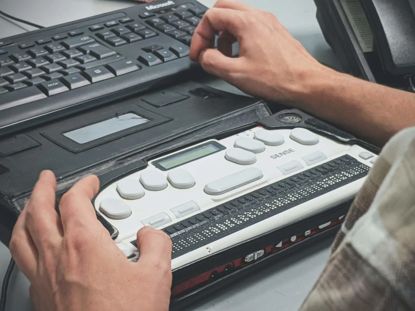 A braille keyboard attached to a computer