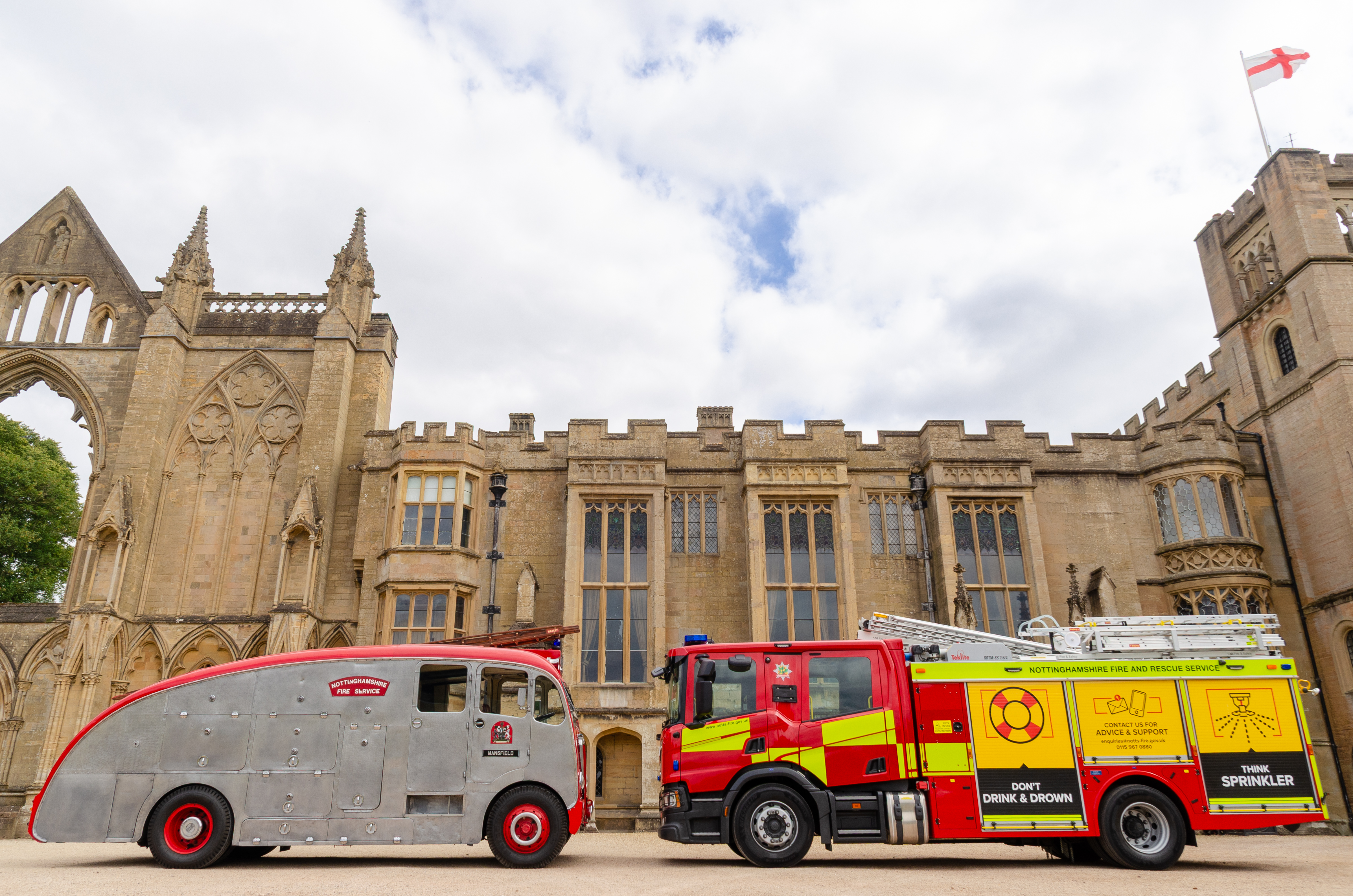 1955 Leyland and 2025 fire appliance face to face in front of Newstead Abbey