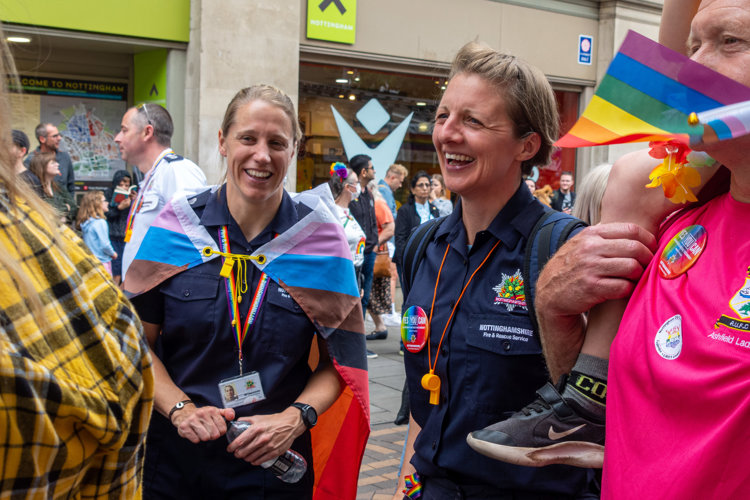 Two firefighters taking part in Nottingham Pride